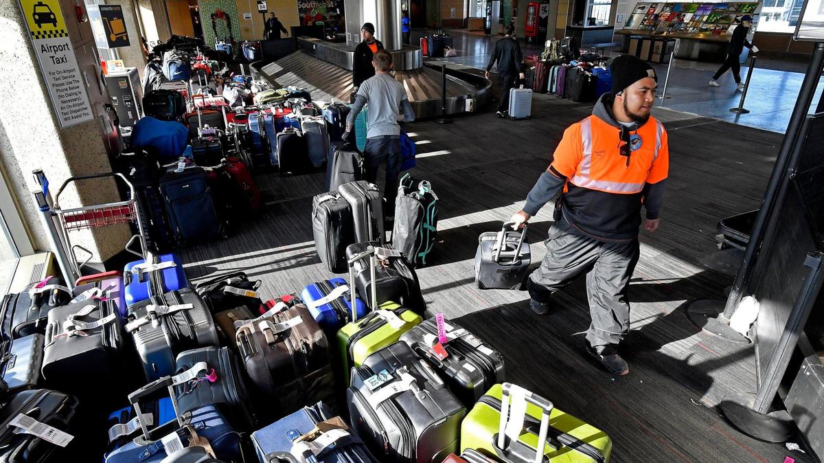 It was an all hands on deck afternoon for operations and ramp personnel at Southwest Airlines, who were alphabetically sorting a sea of baggage Tuesday inside B terminal at Kansas City International Airport. Hundreds of bags made it to Kansas City minus the owners. Dozens of cancellations plagued the airline as a major winter storm rolled across the nation during the Christmas holiday.