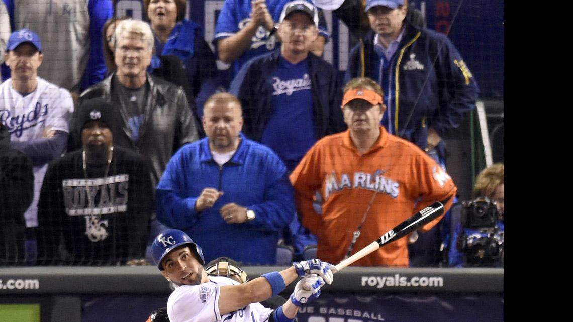 Laurence Leavy, seen in orange in the front row of Game 1 of the World Series at Kauffman Stadium, is a Miami Marlins fan who annually attends many of the biggest sporting events across the country. KC's own Tech N9ne is two seats away from Orange Man, in the cap.
