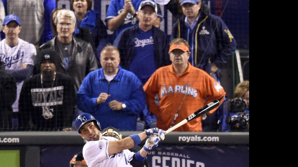 Laurence Leavy, seen in orange in the front row of Game 1 of the World Series at Kauffman Stadium, is a Miami Marlins fan who annually attends many of the biggest sporting events across the country. KC's own Tech N9ne is two seats away from Orange Man, in the cap.
