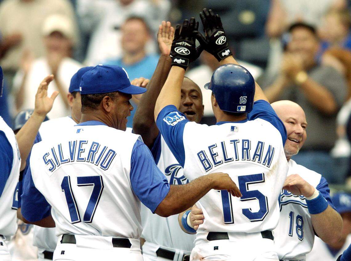 Carlos Beltran #15 of the Kansas City Royals celebrates with fellow teammates as he scores the winning run on a double by Mike Sweeney #29 in the bottom of the ninth inning against the Toronto Blue Jays during a MLB game on May 12, 2004 at Kauffman Stadium in Kansas City, Missouri.