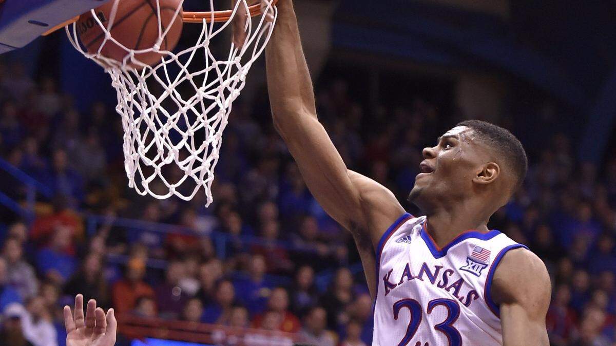 KU forward Billy Preston (23) dunks over Pitt State’s Jonathan Murray during the first half of an exhibition game at Allen Fieldhouse.
