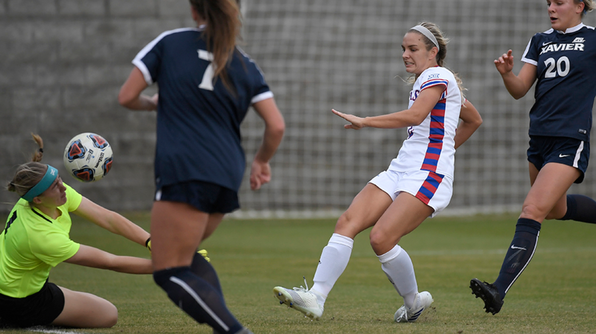 Katie McClure, second from right, scores one of her three goals Friday against Xavier in the NCAA women’s soccer tournament in Columbia, South Carolina.
