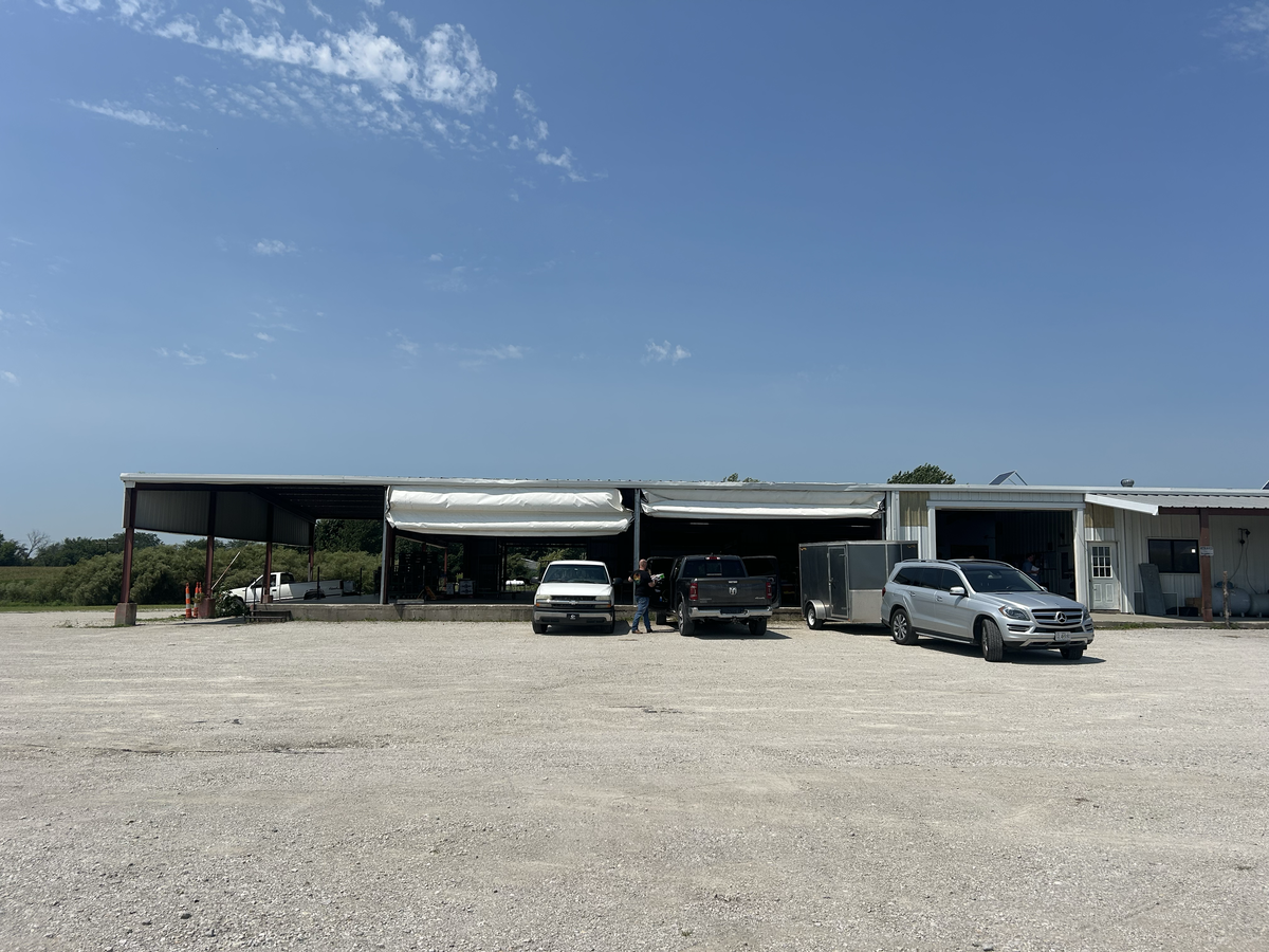 About 50 buyers attended a recent auction, held at a 27,000-square-foot open-air patio in Jamesport.