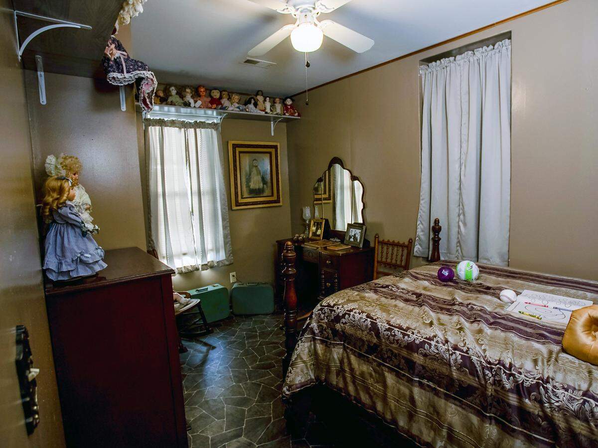 The creepy doll bedroom in the “House of the Ghost Geiger” in Brumley.