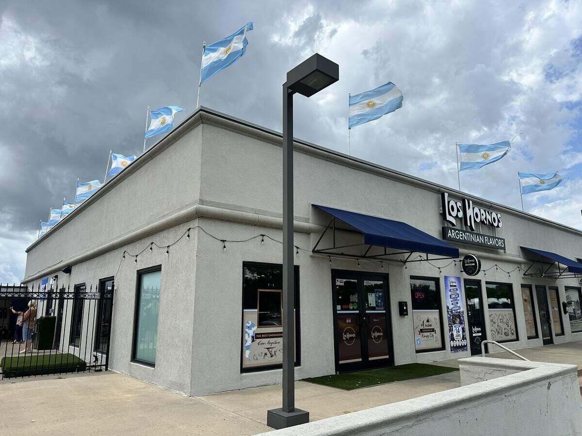 The owners of Los Hornos Argentinian Flavors at 10004 NW Executive Hills Blvd. are going all out to cheer on Argentina in the 2026 FIFA World Cup. The restaurant, photographed on June 11, 2026, has Argentina flags flying across the roof.