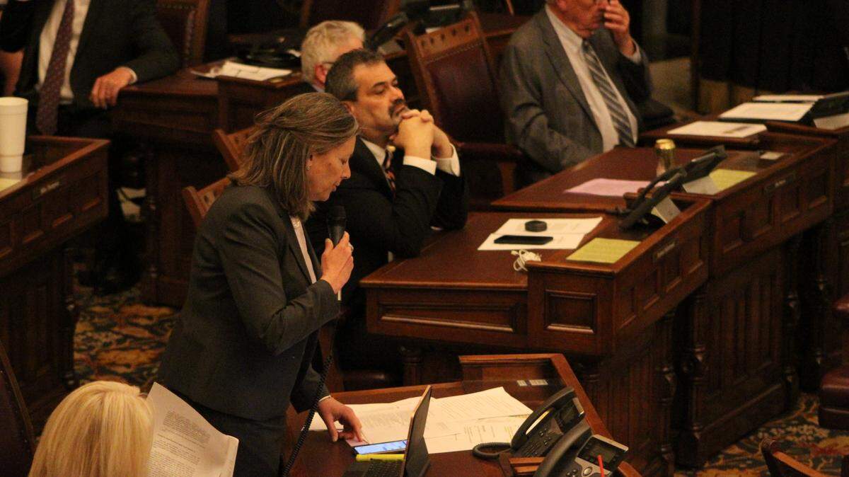 In this May 2021 file photo Kellie Warren, a Leawood Republican, and Richard Hilderbrand, a Baxter Springs Republican, listen to debate on the Senate floor. They are key figures behind a new round of bills to limit the authority of public health officials during a crisis.