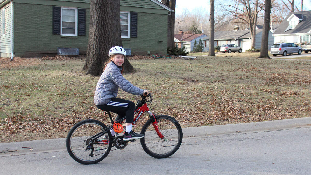 Staying active is one of the key ways to deal with the isolation caused by the pandemic, according to the Stay Strong COVID Support Program. One way Prairie Village resident Harper Newton accomplishes that is by riding a bike.