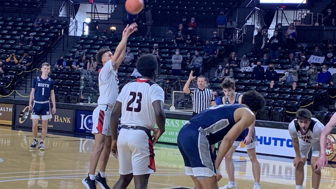 Blue Valley North and Lawrence met in a Class 6A Kansas state semifinal in boys basketball at Wichita’s Koch Arena Thursday afternoon. Blue Valley North, wearing the darker uniforms, prevailed.