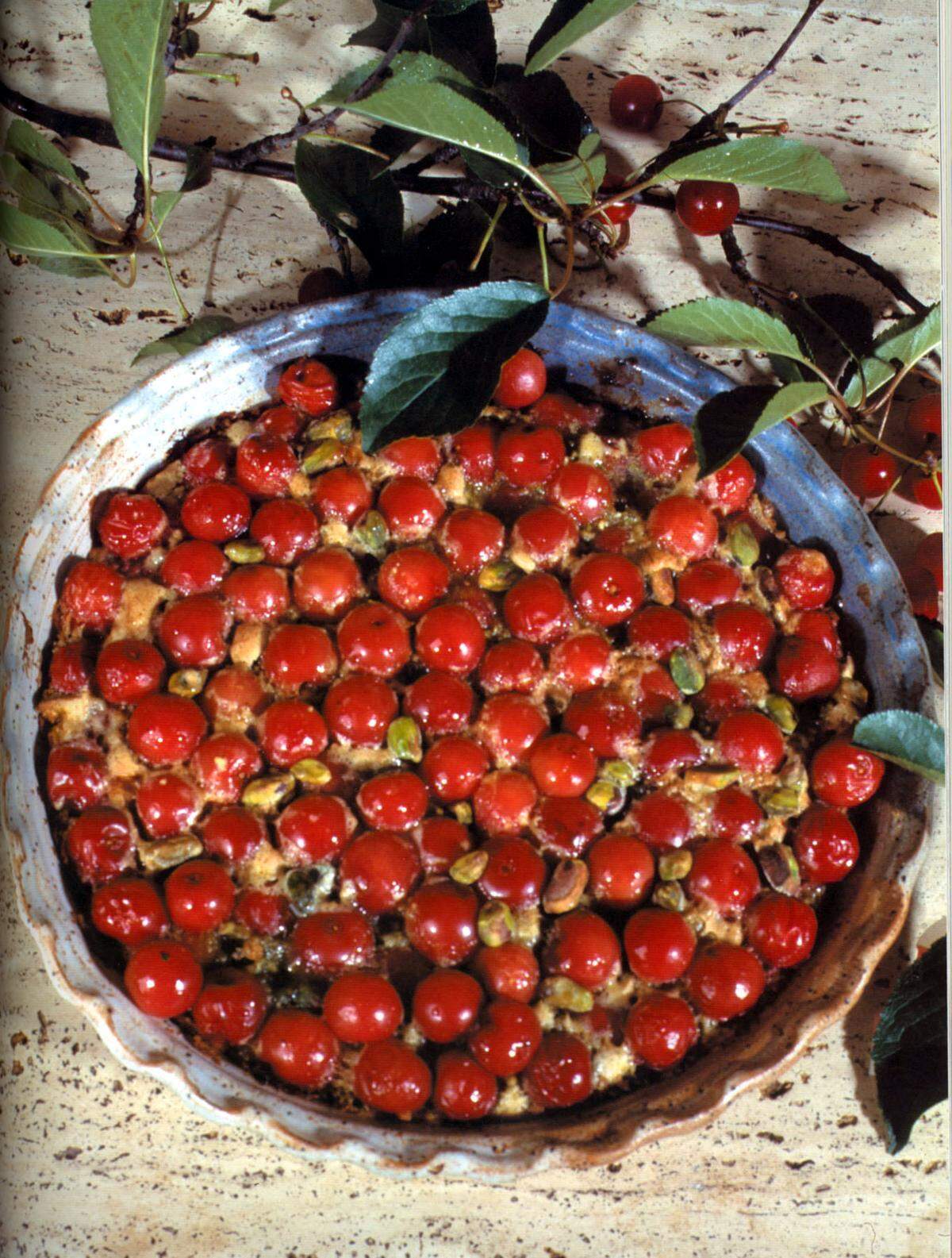 Sicilian Sour Cherry and Pistachio Crostata is featured in the cookbook “Silk Road Cooking: A Vegetarian Journey’’ by Iranian-born Najmieh Batmanglij.