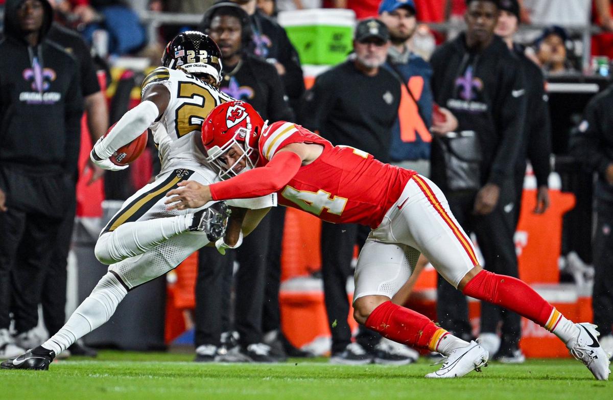 Kansas City Chiefs punter Matt Araiza (14) tackles New Orleans Saints wide receiver Rashid Shaheed (22) in the first half on Monday, Oct. 7, 2024, at GEHA Field at Arrowhead Stadium.