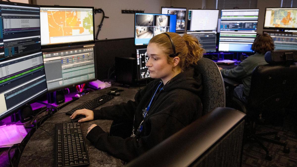 A Lee’s Summit police department employee demonstrated how dispatchers monitor computer screens at the department headquarters on March 18, 2024, in Lee’s Summit.