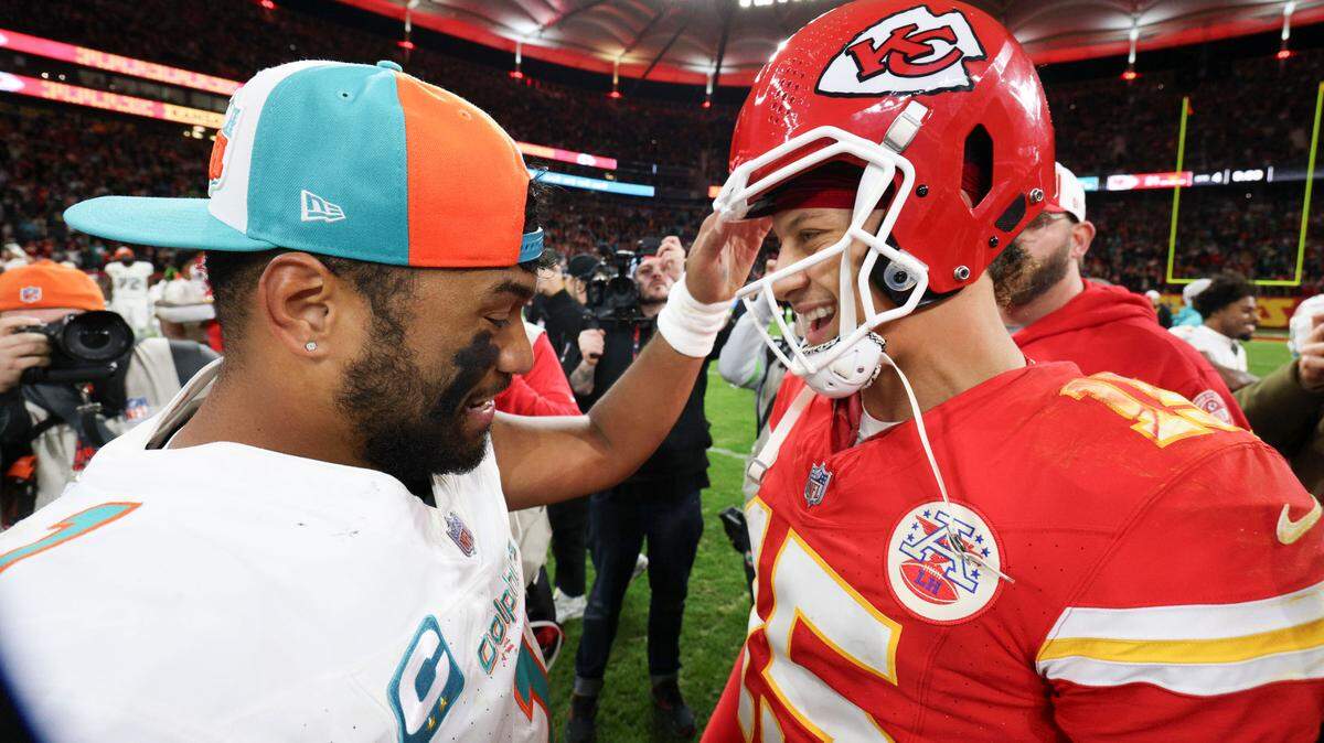 Kansas City Chiefs quarterback Patrick Mahomes (15) greets Miami Dolphins quarterback Tua Tagovailoa (1) after an NFL International Series game at Deutsche Bank Park.