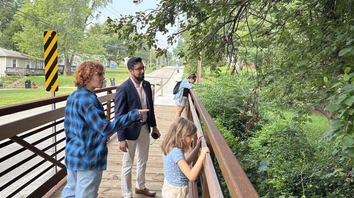 One morning this month, Chaumiere residents Laurel Shoger-Hall (left), and Olivia Meade (far right) and Kansas City Councilman Crispin Rea showed a Star reporter the new sidewalks and other improvements in their neighborhood. Meade’s daughter, Audrey, 5, tagged along.