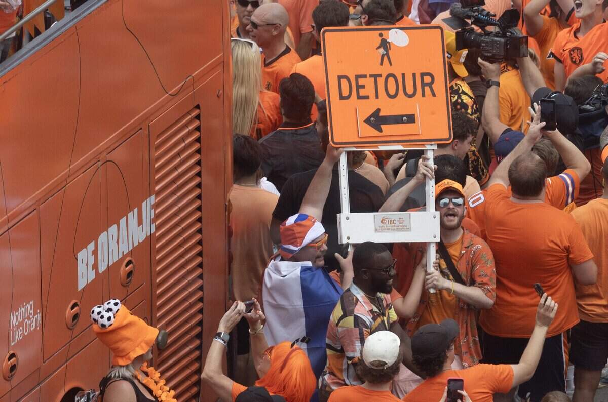 Netherlands soccer fans party at the intersection of Grand and Pershing in downtown Kansas City on Thursday, June 25, 2026.