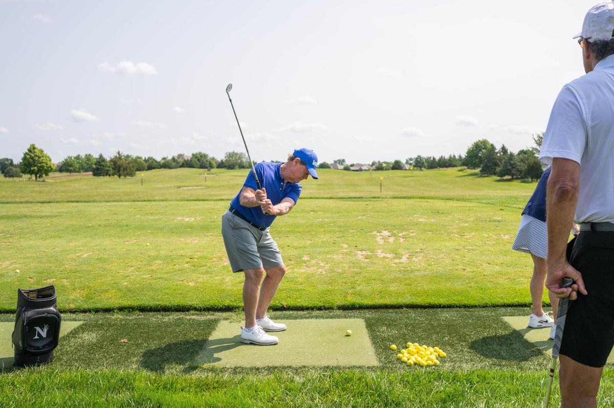 Legendary golfer Tom Watson takes a few practice swings on the range at Nicklaus Golf Club at Lionsgate in Overland Park on Monday, June 2, 2025, before the Joe McGuff Golf Classic on Monday, June 2, 2025.