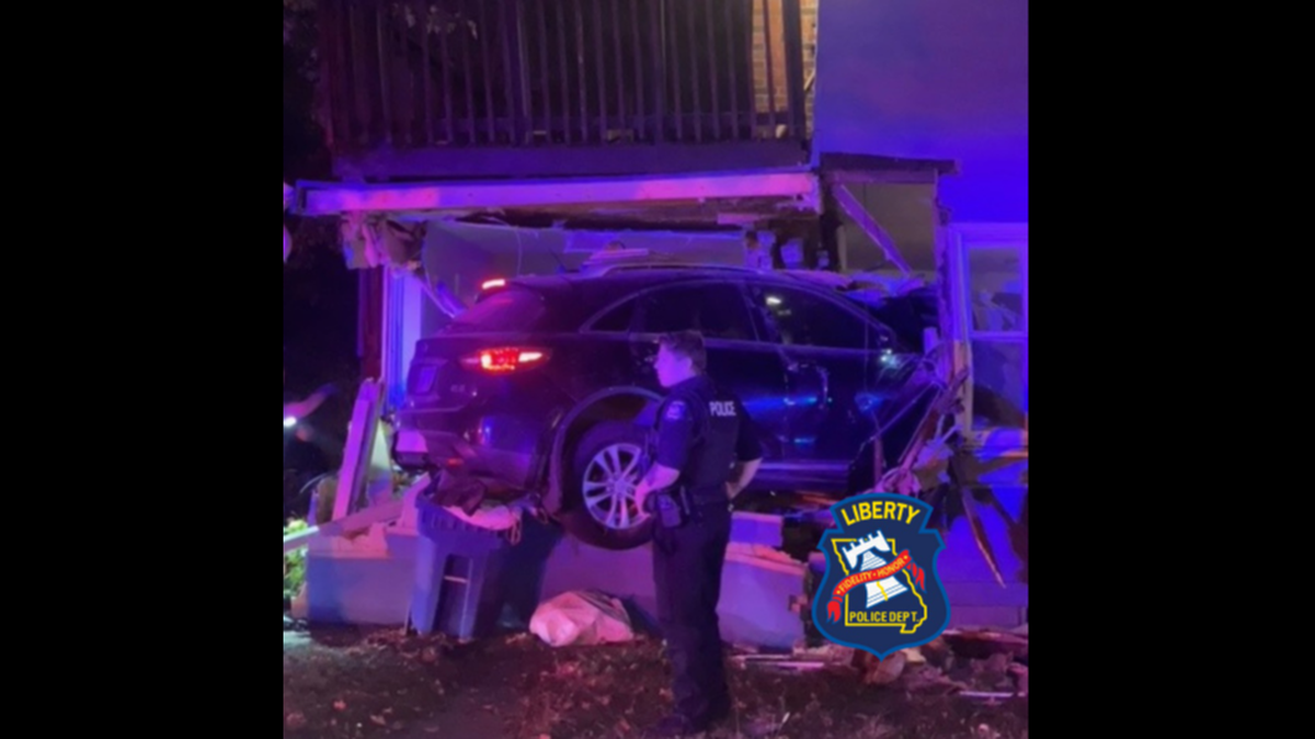A police chase ended shortly after a suspect’s SUV crashed into a Liberty home in the 100 block of South Leonard Street on Sunday night, injuring a person in the home.