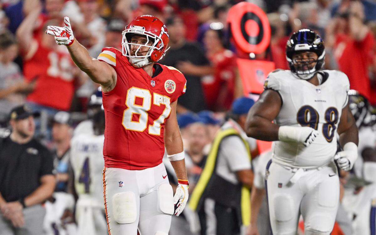 Kansas City Chiefs tight end Travis Kelce signals a first down after making a catch in the second quarter against the Baltimore Ravens Thursday, Sept. 5, 2024, at GEHA Field at Arrowhead Stadium.