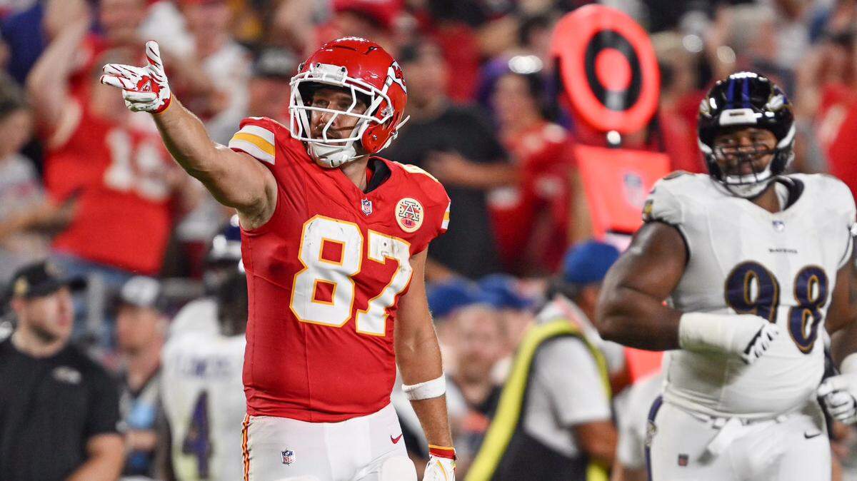 Kansas City Chiefs tight end Travis Kelce signals a first down after making a catch in the second quarter against the Baltimore Ravens Thursday, Sept. 5, 2024, at GEHA Field at Arrowhead Stadium.