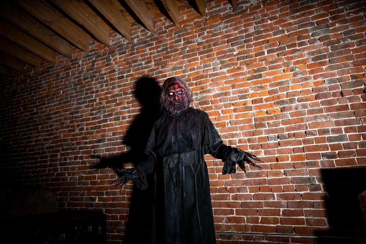 CARDINAL SIN - One of the Seven Deadly Sins, with a piercing gaze, he challenges visitors to confront their darkest impulses, casting an ominous shadow at the Edge of Hell in Kansas City.