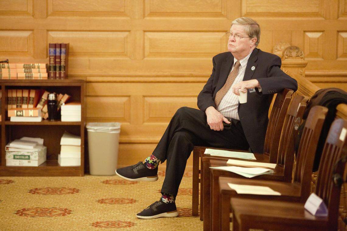 Kansas House Minority Leader Vic Miller, a Topeka Democrat, listens to a budget presentation.