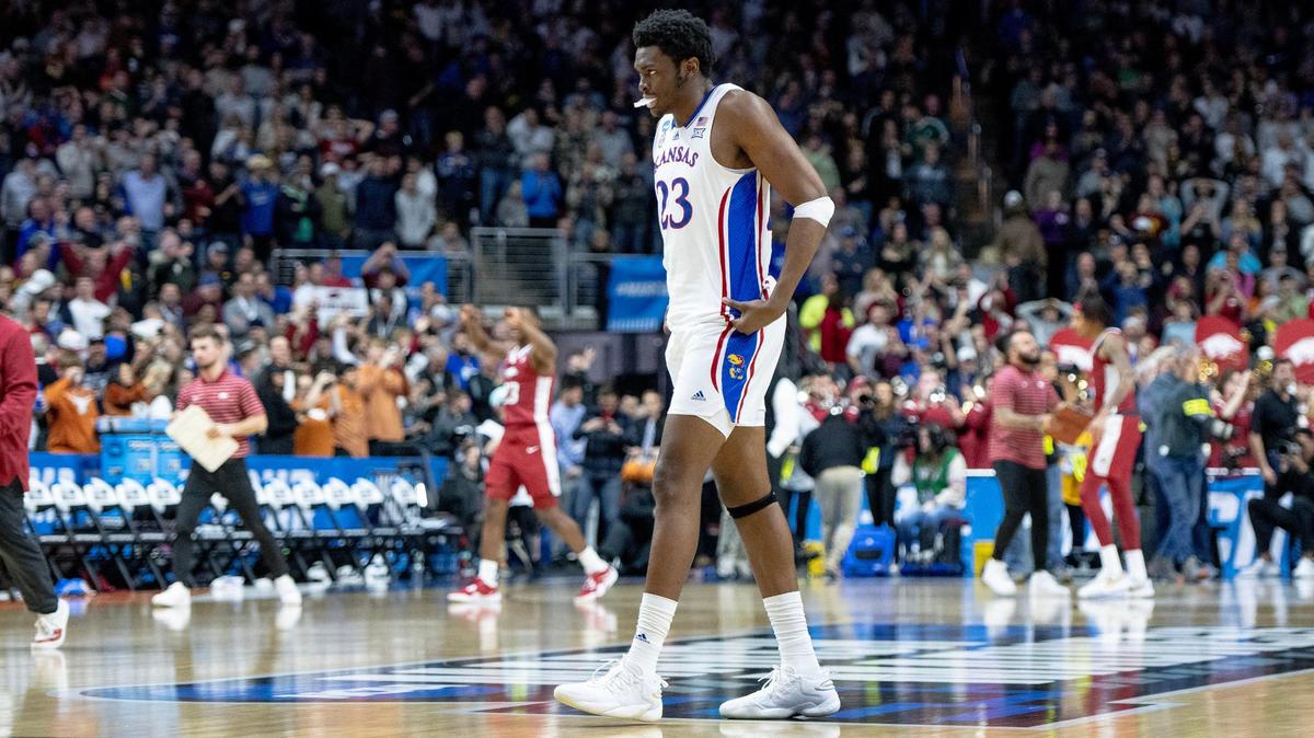 Kansas center Ernest Udeh Jr. (23) walks off the court after losing 72-71 to Arkansas in a second-round college basketball game in the NCAA Tournament Saturday, March 18, 2023, in Des Moines, Iowa.
