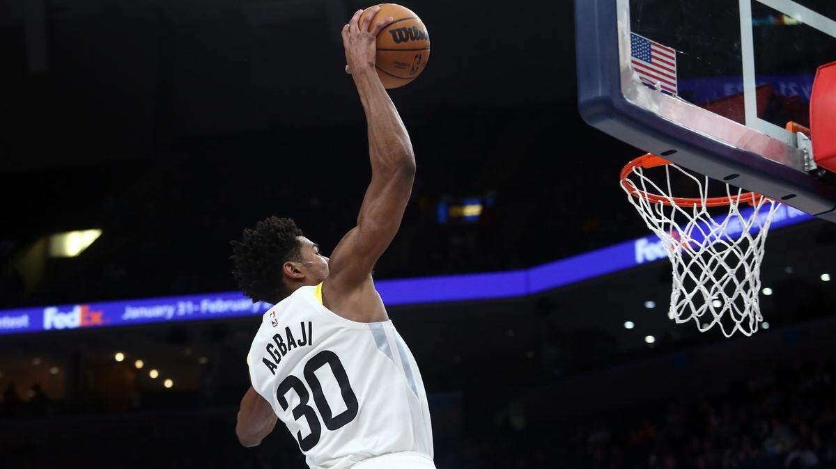 Utah Jazz guard Ochai Agbaji (30) dunks during the second half against the Memphis Grizzlies at FedExForum on Feb. 15, 2023.