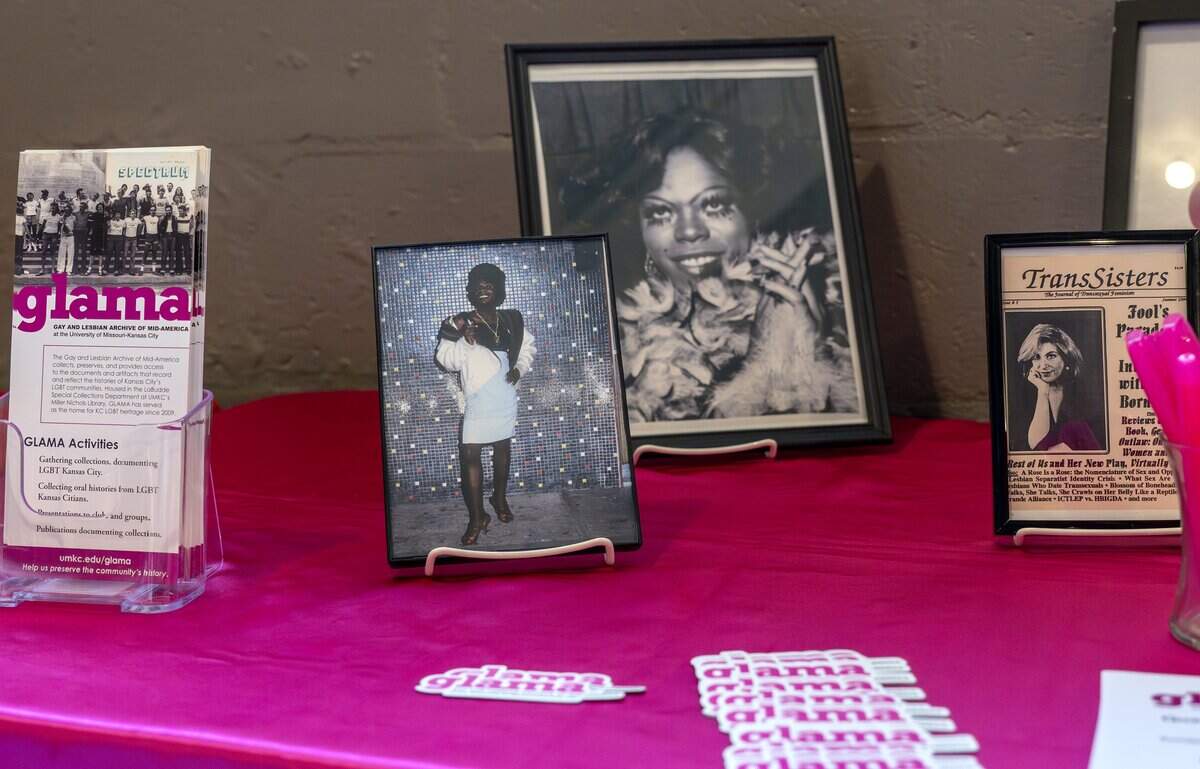 Materials from the Gay and Lesbian Archive of Mid-America are displayed on a table during a Trans Day of Remembrance event at Spirit of Hope MCC on Tuesday, March 31, 2026, in Kansas City.