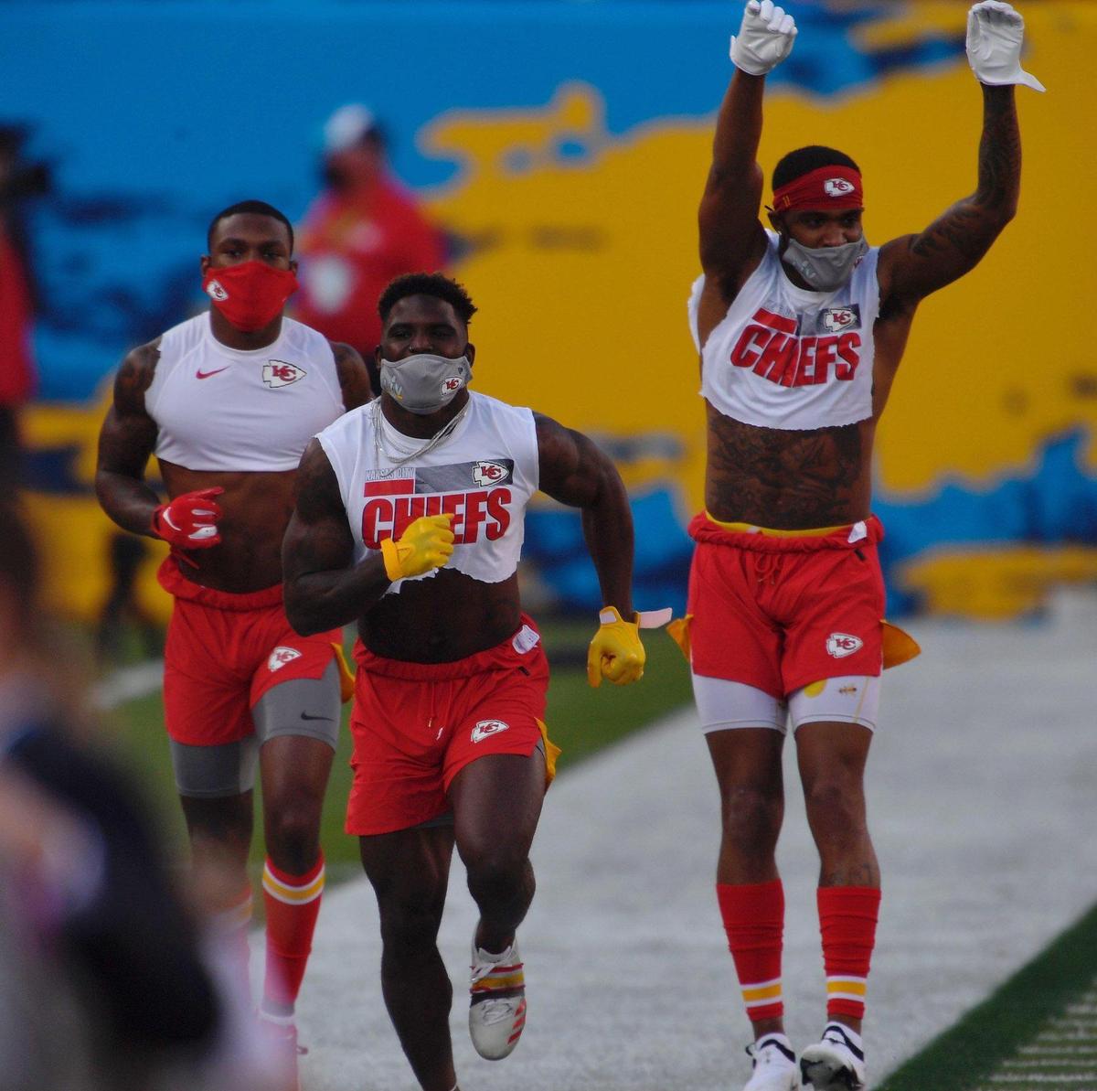 Kansas City Chiefs wide receiver Tyreek Hill, center, warms up with teammates Sunday, February 7, 2021, before Super Bowl LV at Raymond James Stadium in Tampa, Florida.