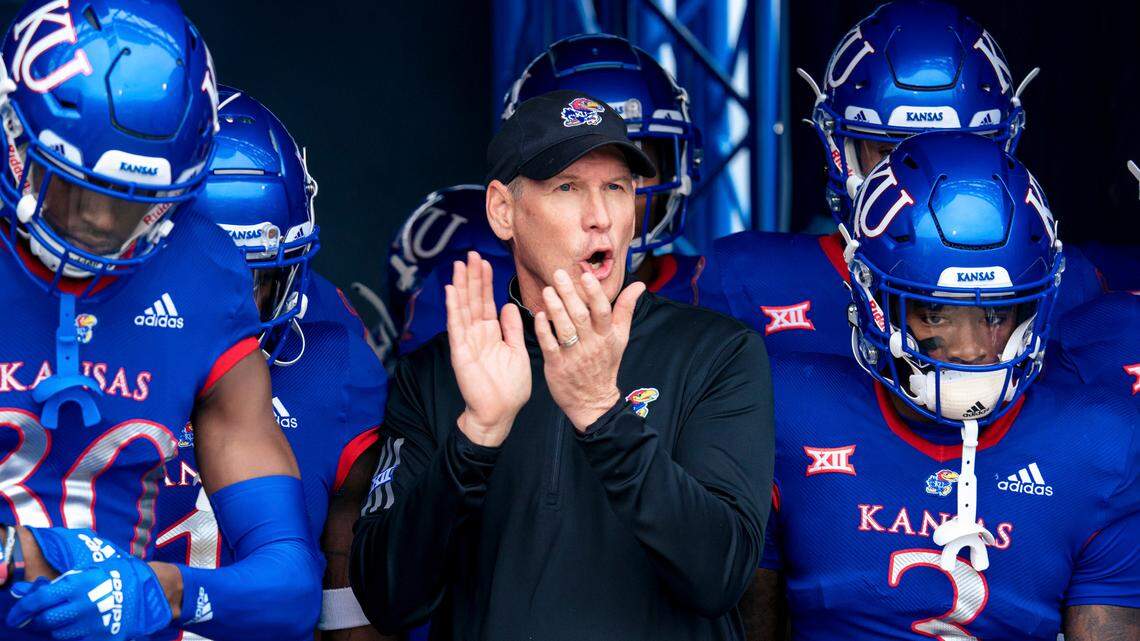Kansas Jayhawks football coach Lance Leipold leads his team out of the tunnel before a game at David Booth Memorial Stadium in Lawrence.