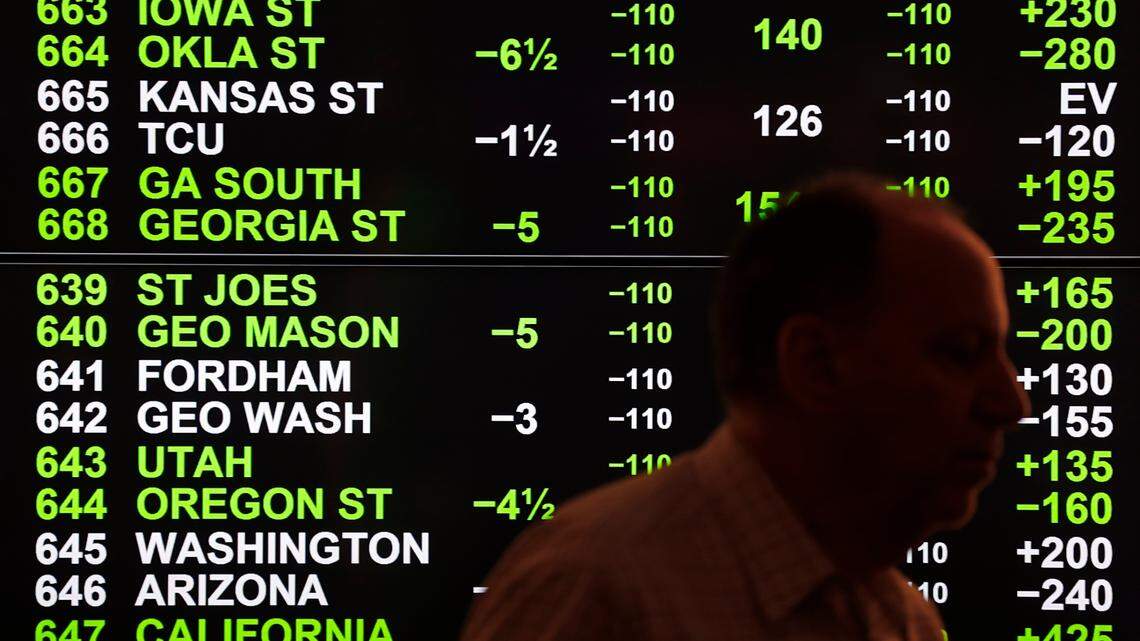 Odds for college basketball are shown during the launch of legalized sports betting in Michigan on March 11, 2020, at the MGM Grand Detroit casino sports book in Detroit. Kansas lawmakers are nearing the finish line on sports betting legislation.