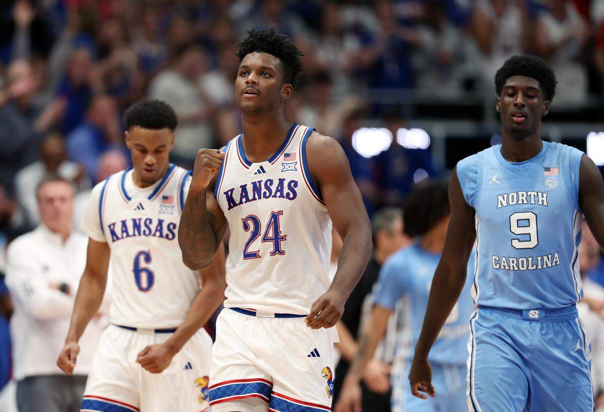 KJ Adams #24 of the Kansas Jayhawks reacts after drawing a foul during the first half of the game against the North Carolina Tar Heels at Allen Fieldhouse on November 8, 2024 in Lawrence.
