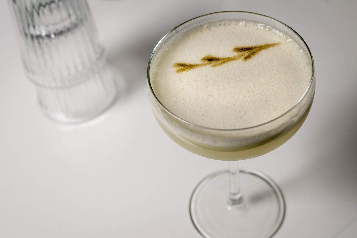 The Greener Pastures cocktail made by Nate Tallman, the bar manager at Drastic Measures, on Thursday, March 12, 2026, at the downtown Shawnee bar. 