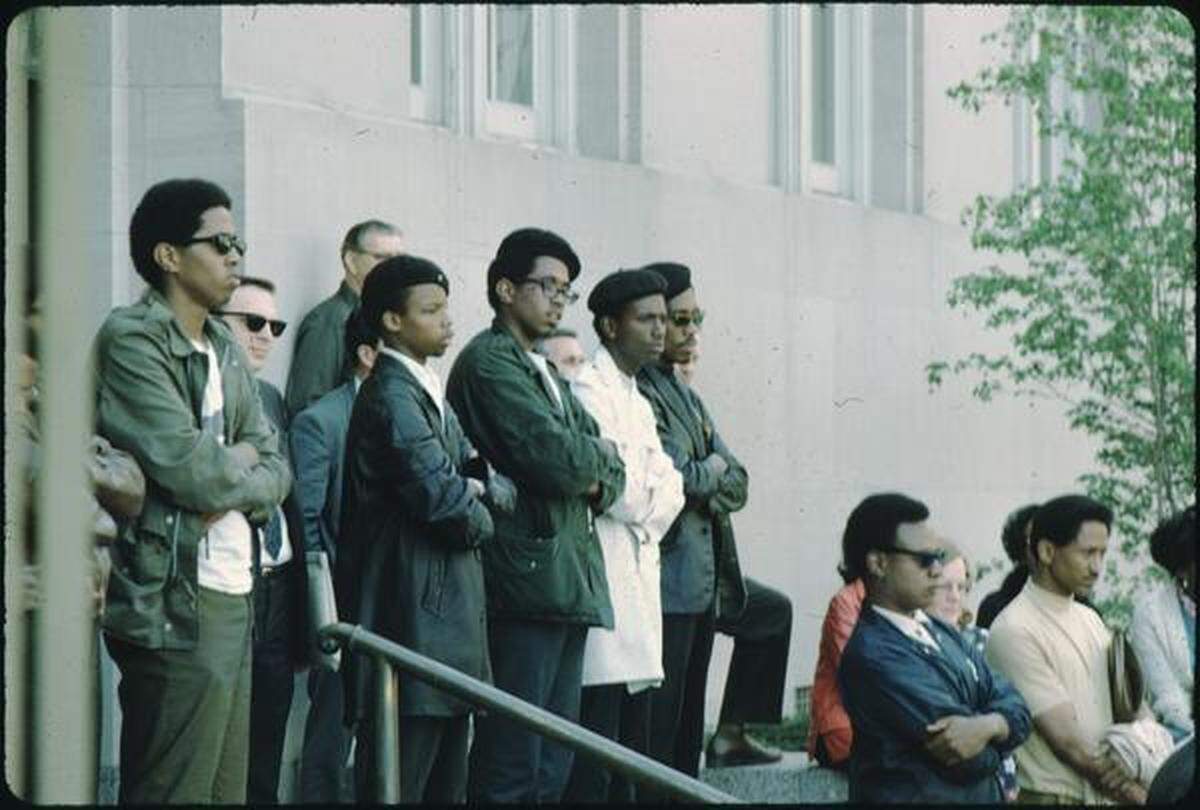 Black Panther members standing with the crowd on the steps of the Jackson County Courthouse on May 1, 1969. O’Neal is not pictured.