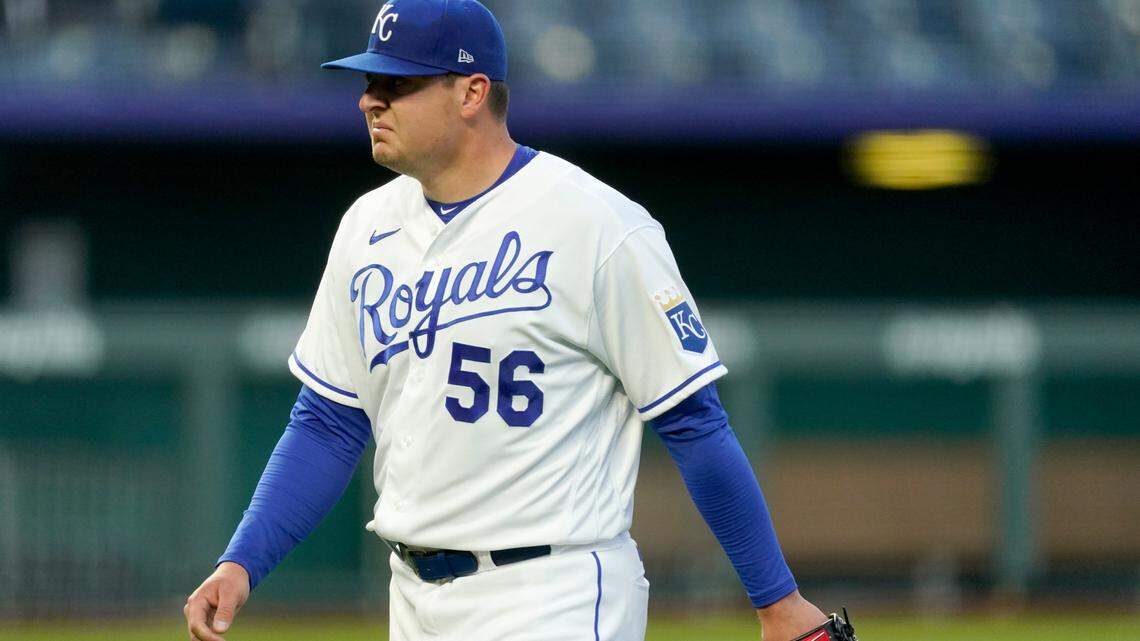Kansas City Royals starting pitcher Brad Keller walks to the dugout after coming out of the game during the second inning of a baseball game against the Tampa Bay Rays Tuesday, April 20, 2021, in Kansas City, Mo. (AP Photo/Charlie Riedel)