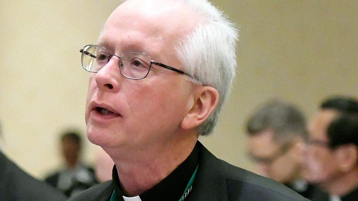 In this file photo, Bishop John B. Brungardt, of Dodge City, Kansas, read a prayer at the start of the Fall General Assembly of the U.S. Conference of Catholic Bishops on Tuesday, Nov. 12, 2019, in Baltimore.