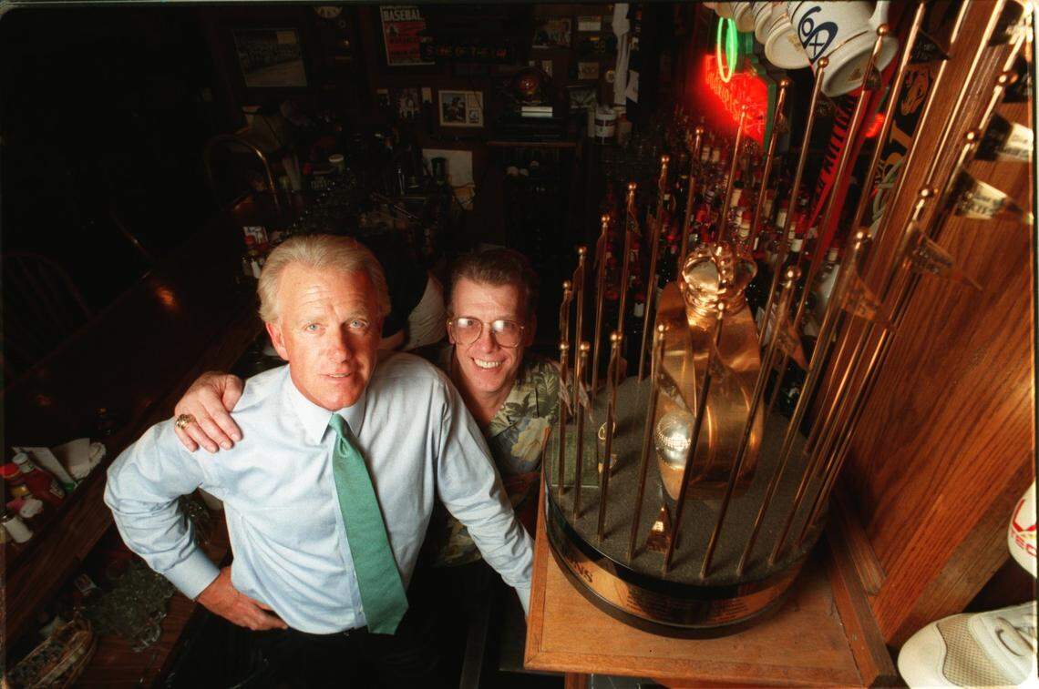 Caption: 9/22 xas1 mon sprts CUTLINE: Former player Lew Krausse and restauranteur Jim Chappell posed with the A’s 1973 World Series trophy, a reminder of what might have been for Kansas City. Photographer: RICH SUGG Credit: THE STAR Date: 19970922 Category: SPT Keyword: PORTRAIT Keyword: SPORT Keyword: BASEBALL Keyword: HISTORIC