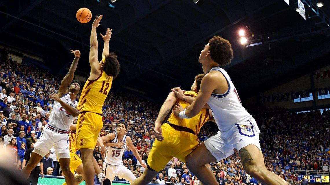 KU’s KJ Adams puts up the game-winner over ISU’s Robert Jones in the final seconds of the Jayhawks’ 62-60 win at Allen Fieldhouse on Jan. 14, 2023.