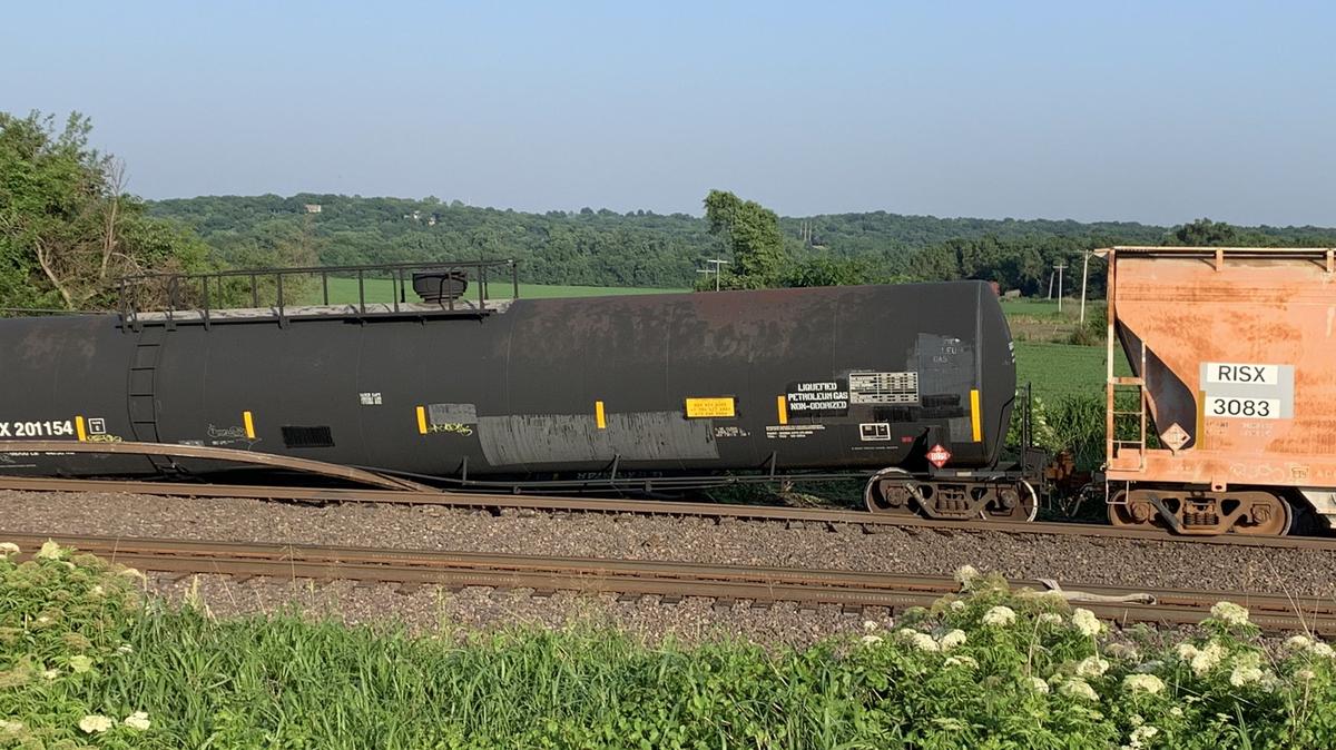A commercial train that was towing rail cars with hazardous materials inside derailed Friday in Bonner Springs, prompting a response from area firefighters, authorities said. No one was injured and authorities did not find a sign of a HAZMAT leak.