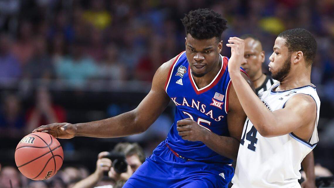 Kansas center Udoka Azubuike (left) and the Jayhawks will have a home game against defending national champion Villanova, road contest against Kentucky in the SEC/Big 12 Challenge and neutral-site contest against Michigan State in the Champions Classic as part of the 2018-19 nonconference men’s basketball schedule, which was released Friday.