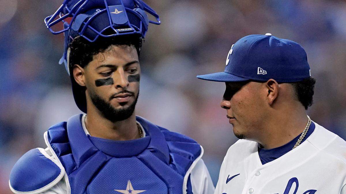 Kansas City Royals catcher MJ Melendez (left) greets starting pitcher Angel Zerpa as Zerpa comes out of the game during the fifth inning against the Angles on Tuesday, July 26, 2022, at Kauffman Stadium in Kansas City.