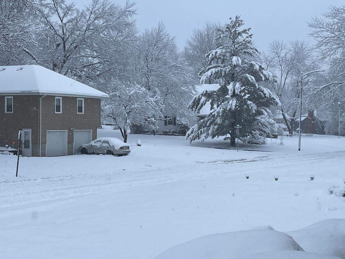 The neighborhoods in Grandview, located just south of Kansas City, received about six inches of snow overnight. By 9:30 a.m. Tuesday, thick and heavy snow continued to fall through the city, blanketing tree branches and utility power lines. Crews were expected to focus on the various emergency snow routes until the snowfall had concluded. Neighborhood streets are expected to be cleared beginning Tuesday evening, said Valarie Poindexter, city spokeswoman.