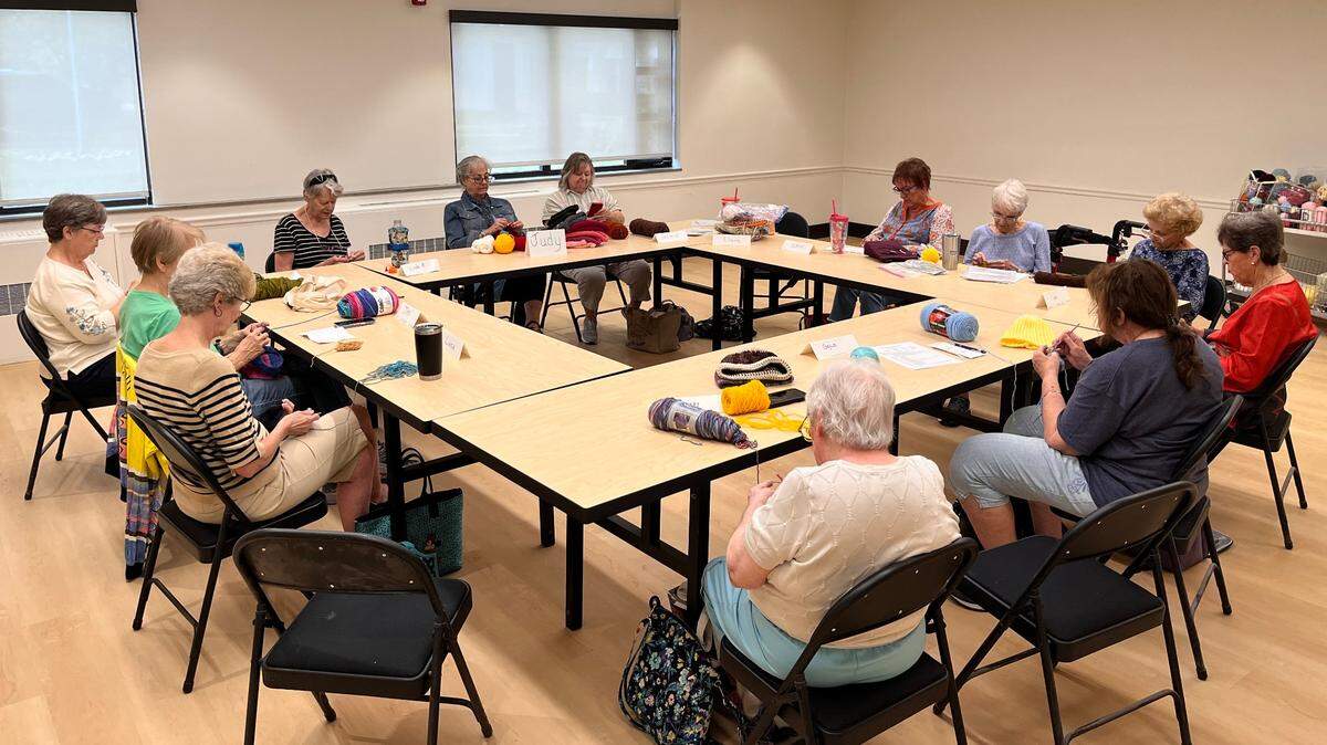 The Caring Hands Knitting Group meets every Tuesday afternoon at the Roeland Park Community Center. The knitters use donated yarn to make hats to be given to children and adults through 20 area nonprofits.