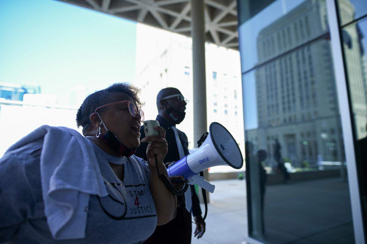 Sheryl Ferguson, an organizer with It’s Time 4 Justice, said she was protesting a lack of transparency and accountability outside a police board meeting on Tuesday, Aug. 25, 2020. 