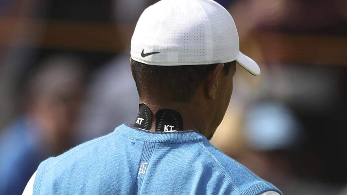 Tiger Woods of the US waits to putt on the 1st green during the first round of the British Open Golf Championship in Carnoustie, Scotland, Thursday July 19, 2018. (AP Photo/Jon Super)