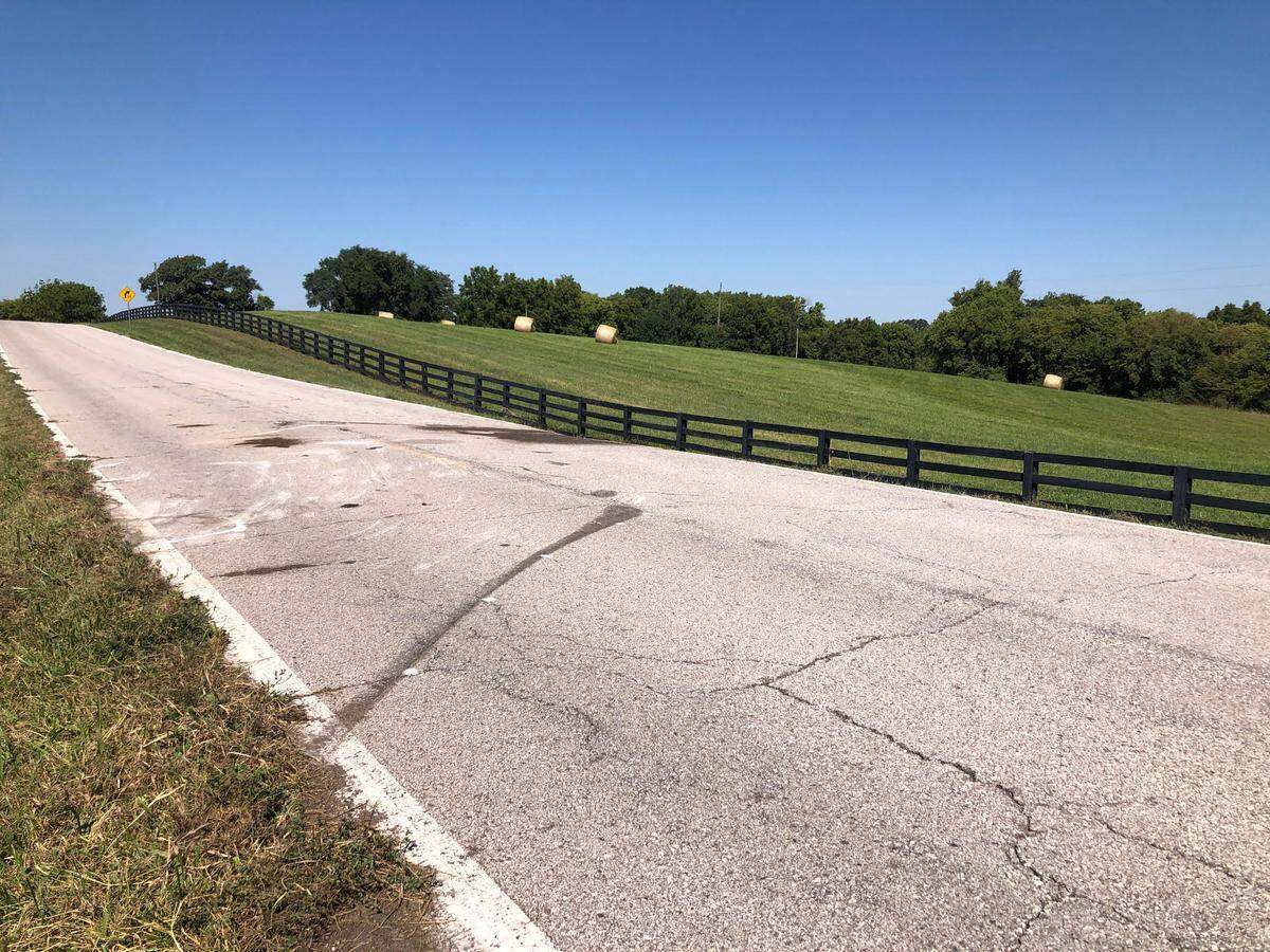 Tire tracks on a rural stretch of Mt. Olivet Road between Jami Drive and Northeast 120th Street show where a school bus carrying 30 Smithville elementary students left the road and overturned on Monday, September 12.