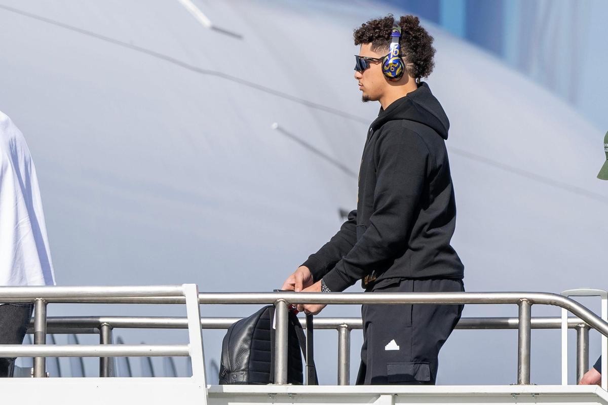 Kansas City Chiefs quarterback Patrick Mahomes boards a United Airlines flight with teammates from Kansas City International Airport on Sunday, Feb. 2, 2025, traveling to New Orleans for Super Bowl LIX.