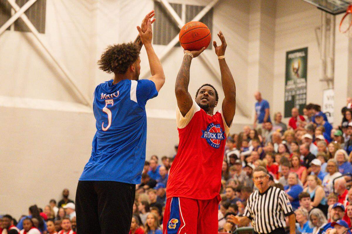 Mario Chalmers takes a jump shot over Zeke Mayo during the Rock Chalk Roundball Classic at Free State High in Lawrence, Kansas on Thursday, June 4, 2026.