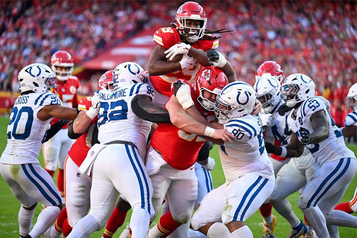 Chiefs running back Kareem Hunt goes up and over during a Sunday, Nov. 23, 2025 NFL game against the Indianapolis Colts at GEHA Field at Arrowhead Stadium in Kansas City.