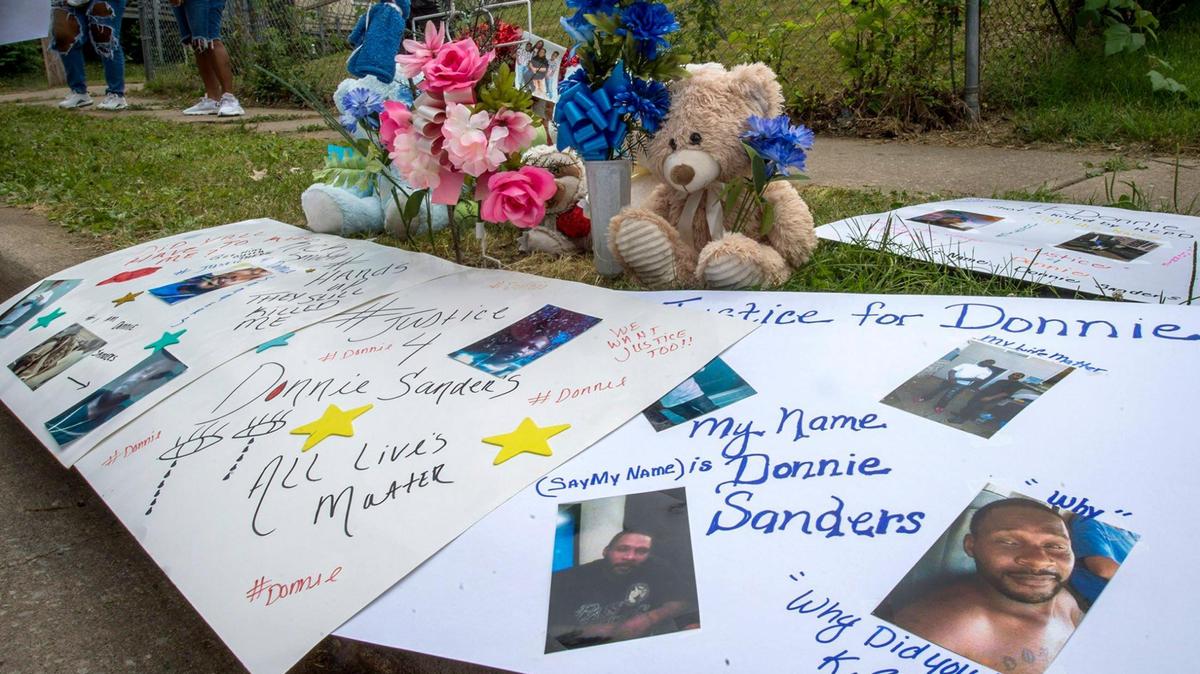 The family of Donnie Sanders gathered to talk about Donnie, who was fatally shot by a Kansas City police officer in March 2020. A memorial for Donnie Sanders, 47, sits on the sidewalk near the location where he was fatally shot at E. 52nd Street and Wabash Avenue in Kansas City. Donnie was unarmed at the time of the shooting.