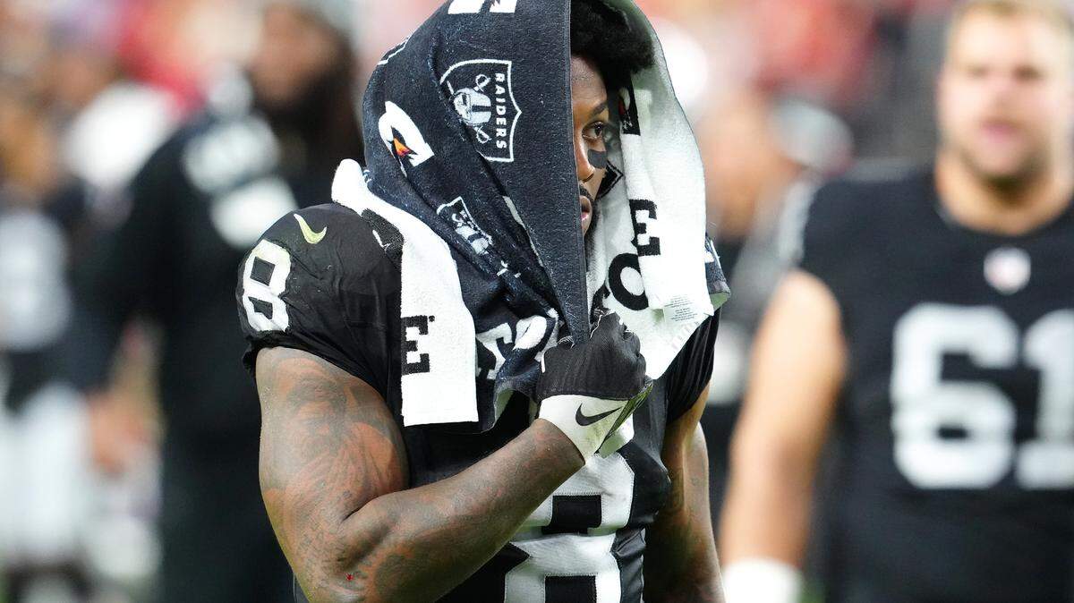 Las Vegas Raiders running back Josh Jacobs (8) walks off the field after the Chiefs defeated the Raiders 31-17 at Allegiant Stadium.